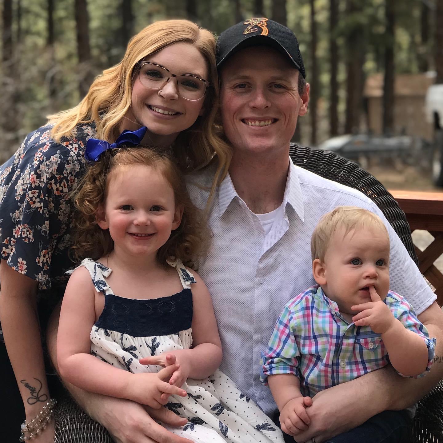 a smiling family picture in a circle shape